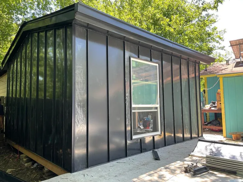 Black standing seam metal wall panels for Roof Inspection in South Huntingdon